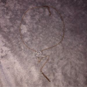 Urban planet necklace with an open hoop crystal detailing